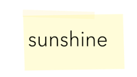 a yellow post it note with the word sunshine on it