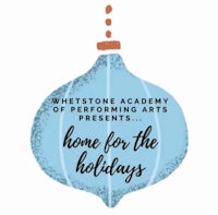 a blue ornament with the words home for the holidays