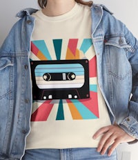 a woman wearing a t - shirt with a cassette tape on it