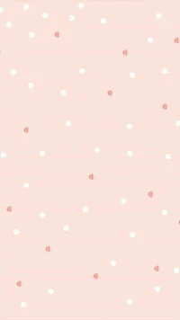 a pink and white polka dot wallpaper