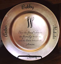 a plate with the names of the bride and groom on it