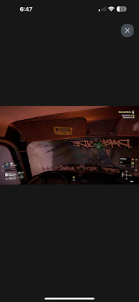 a picture of a car with graffiti on it
