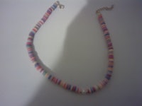 a necklace with multi colored candy canes