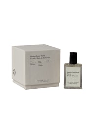 a bottle of cologne with a box next to it