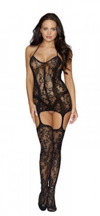 a woman wearing a black lace bodystocking and stockings
