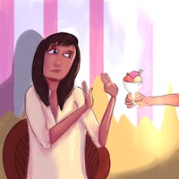 a woman is giving a woman an ice cream cone
