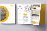 a book with a yellow cover and an illustration of a planet
