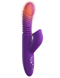 a purple vibrating toy with an orange light on it