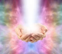 a person's hands are holding a light in front of a colorful background