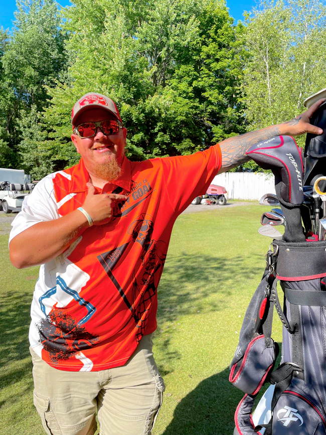Golfer with golf bag