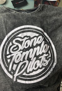 a t - shirt with the word stone temple pilots on it