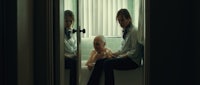 a man and a woman sitting in a bathtub