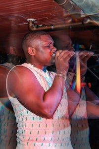 a man singing into a microphone