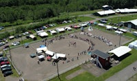 an aerial view of a fairground with a lot of people