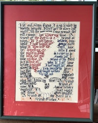 a framed piece of art with a quote on it