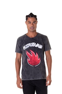 a man wearing a black t - shirt with a red flame on it