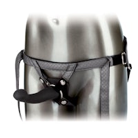 a mannequin torso with a black harness