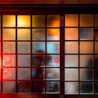 a glass door with a sign on it