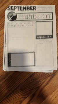 a sheet of paper with the word integrity on it