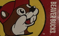 a beaver bucks logo on a red and yellow plate