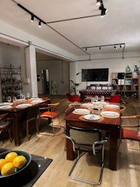 a dining room with a table and chairs