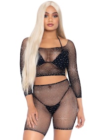 a woman in a black mesh bodysuit and panties