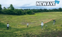 a group of people standing in a field with the words newwave
