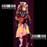 two women standing next to a bear and a barcode