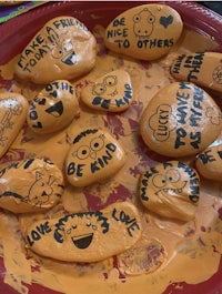 valentine's day rocks with drawings on them