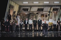 a group of people standing on a stage