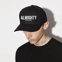 a man wearing a black hat with the word almighty on it