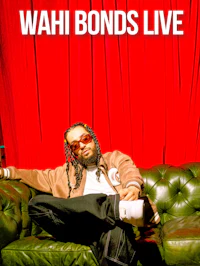a man sitting on a couch with the words wahi bonds live