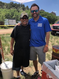 two men standing next to each other