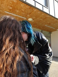 a woman with blue hair