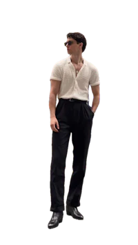 a man wearing a white shirt and black pants