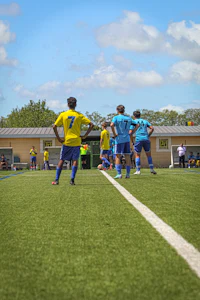 a group of soccer players on a field