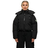 a woman wearing a black puffer jacket