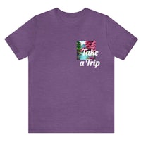 a purple t - shirt that says take a trip