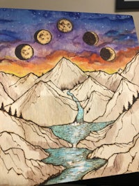 a painting of mountains and a river with the moon in the sky