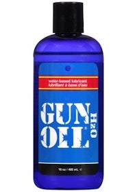 a bottle of gun oil on a white background