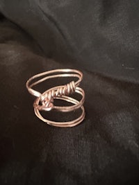 a ring with a wire wrapped around it