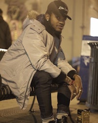 a man sitting on a bench