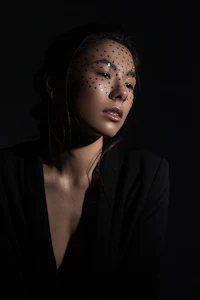 a woman with polka dots on her face