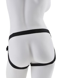 the back view of a mannequin wearing black lingerie