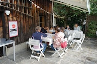 a group of people sitting at a table