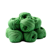 a pile of green yarn on a black background