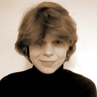 a black and white photo of a woman with red hair