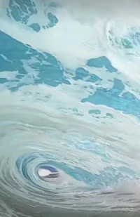 a surfer is riding a wave in the ocean