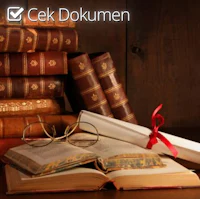 a stack of books on a wooden table with a red ribbon