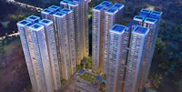an aerial view of a group of tall buildings at night